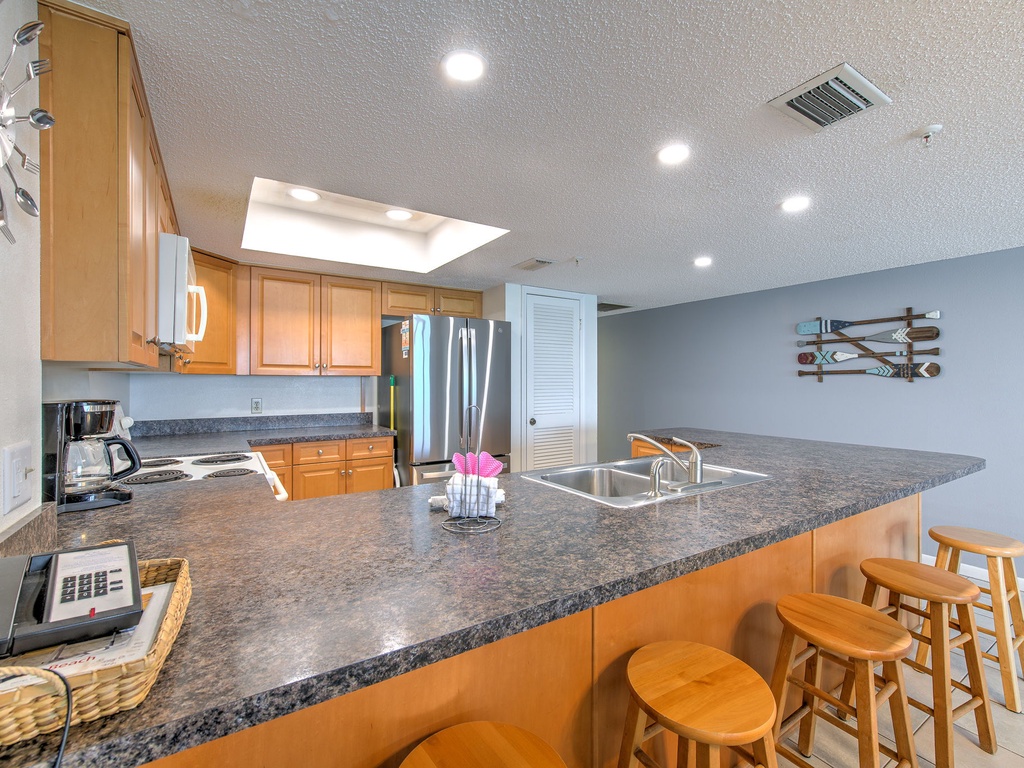 Cook memorable meals in your spacious granite-topped kitchen, complete with modern appliances and cozy breakfast bar seating.