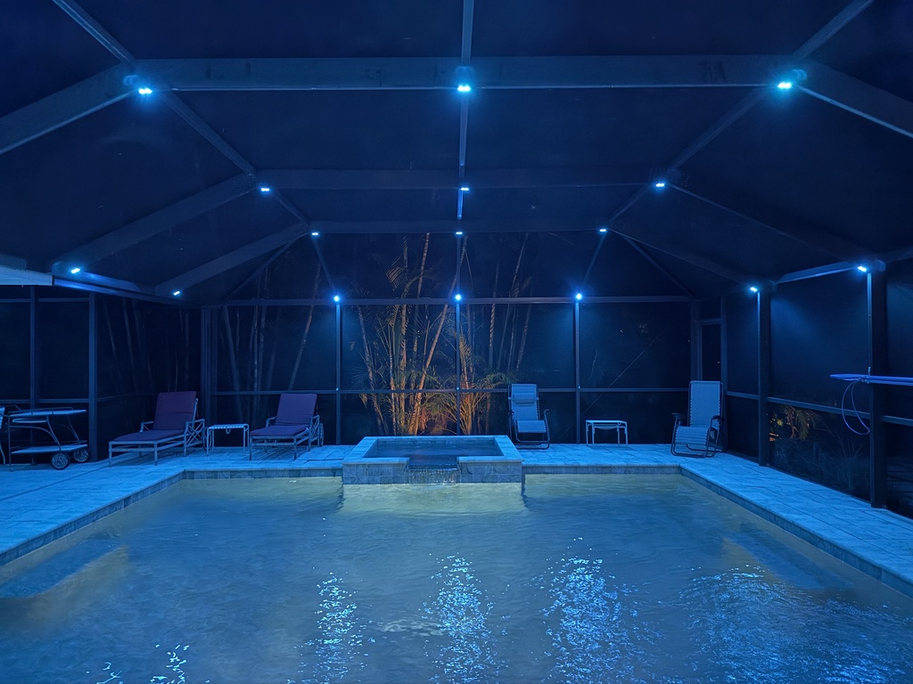 The Shaded Sanctuary nighttime pool adjustable lights