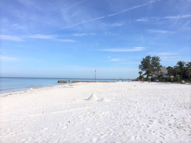 Beautiful sandy beach steps away