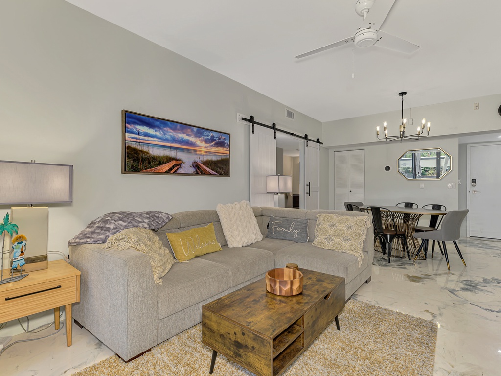 Sink into plush comfort in your stylish living space, complete with modern furnishings and a cozy atmosphere perfect for relaxing.