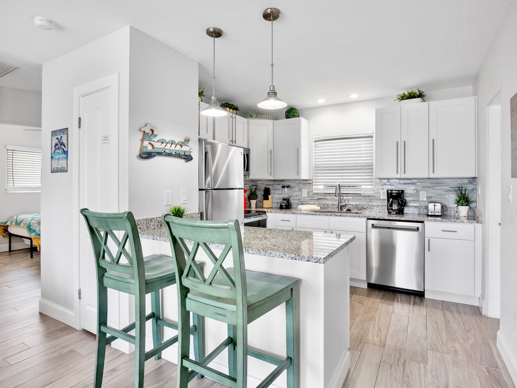 Modern coastal kitchen with island seating