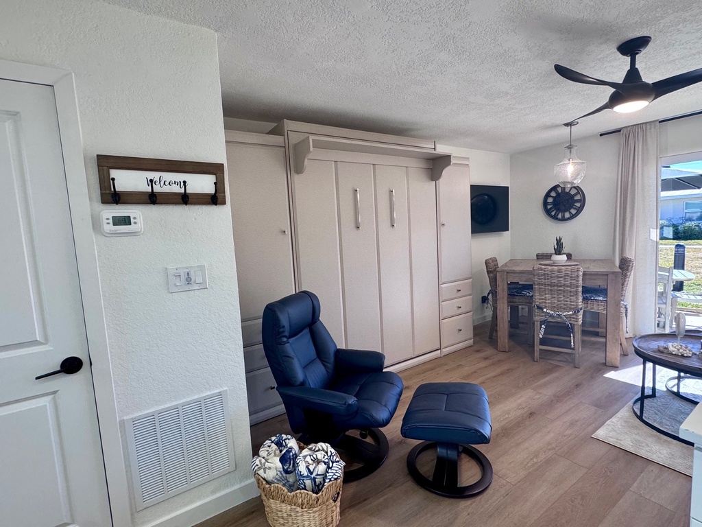 Relax in your comfy recliner while enjoying the open floor plan that seamlessly connects living and dining areas.