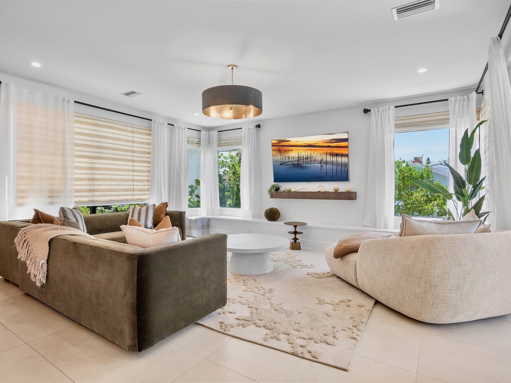 Living Room with Plush Seating and TV