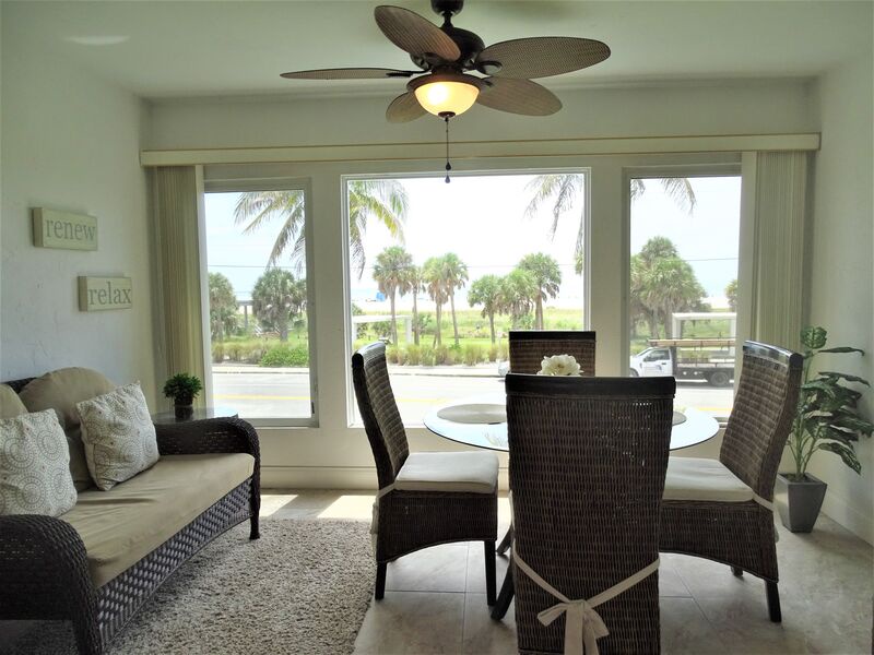 Living and Dining with Tropical Views