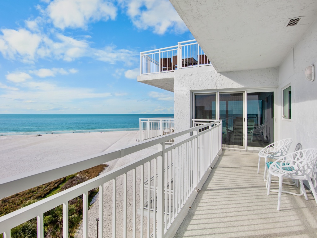 Soak in breathtaking ocean views from your private balcony, where white sands and turquoise waters stretch endlessly before you.