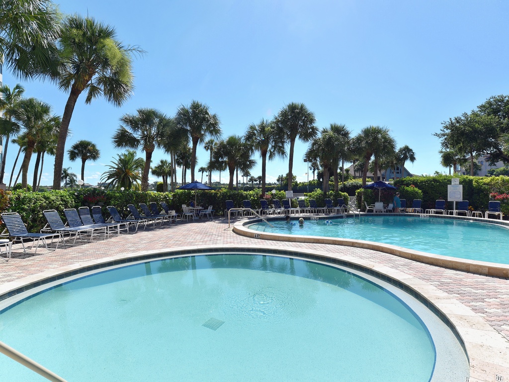 Soak up the Florida sunshine by sparkling pools surrounded by swaying palms and comfortable loungers.