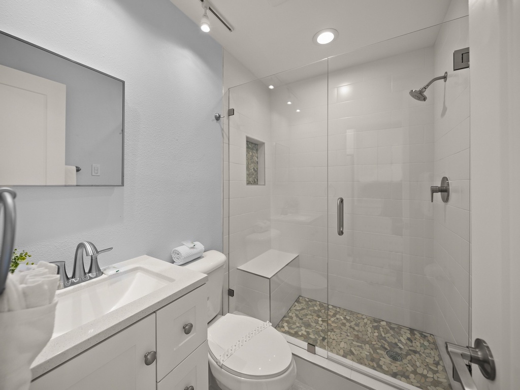 Unwind in your spa-like ensuite featuring a rainfall shower, soaking tub, and modern finishes that create your perfect retreat.