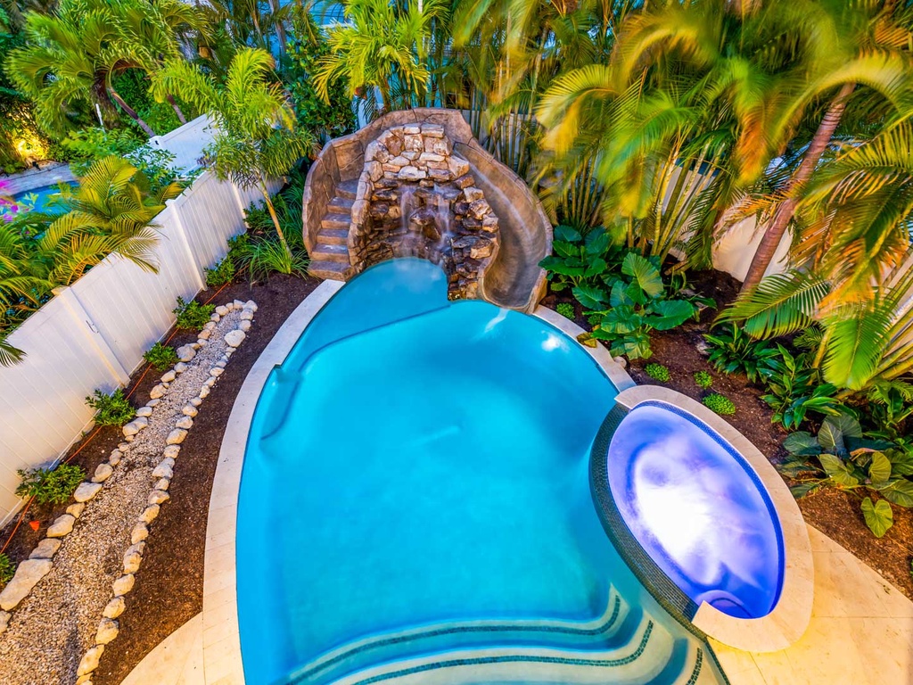 View from Balcony at Sunset - Pool and Spa with a Waterslide