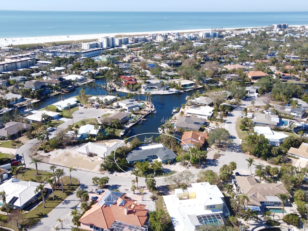 Aerial view of the home on the canal