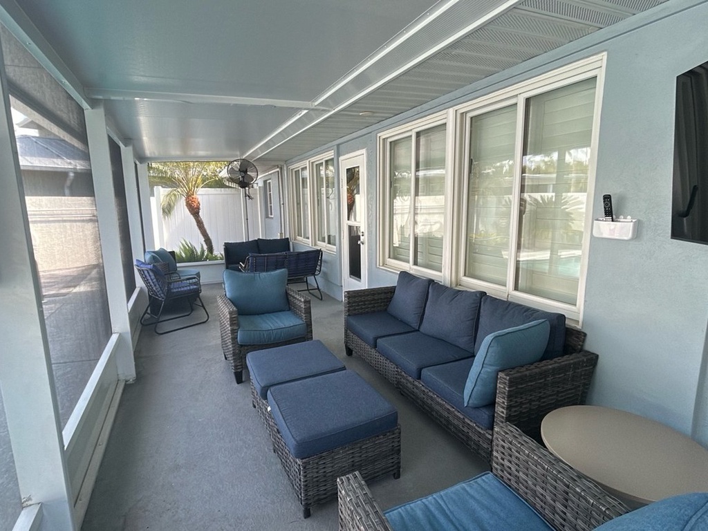 Your covered poolside lanai offers comfortable seating where you can relax with morning coffee or evening cocktails while staying cool in the shade.