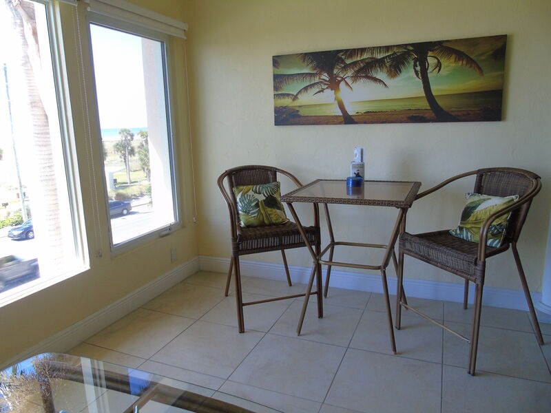 Screened lanai with comfortable seating