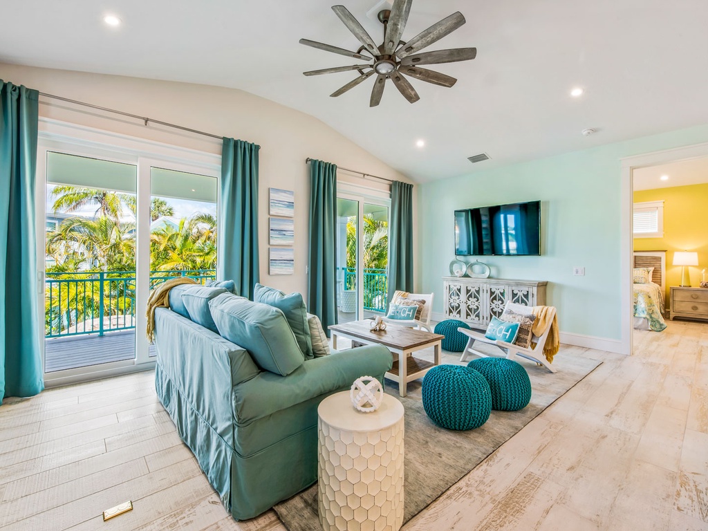 Open style living room with a queen sleeper sofa