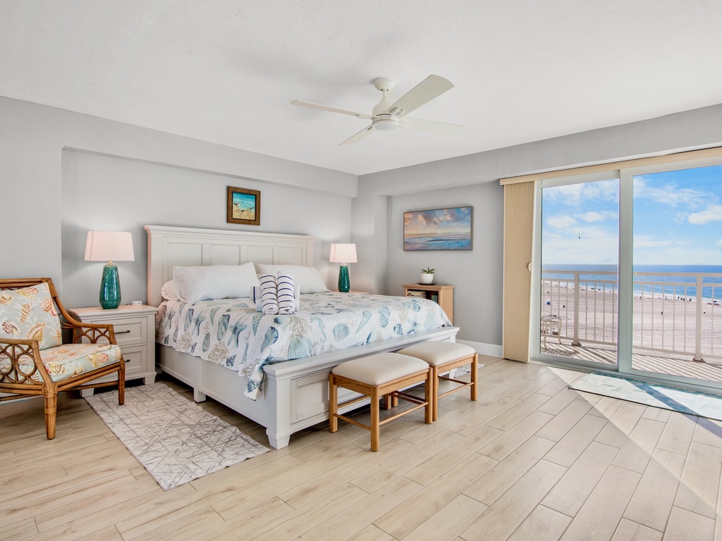 Wake up to stunning ocean views from your coastal-themed bedroom, where sea breeze flows through your private balcony doors.