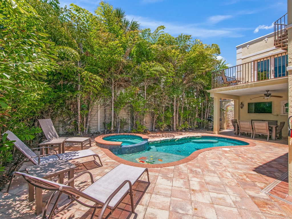 Pool area with relaxing loungers