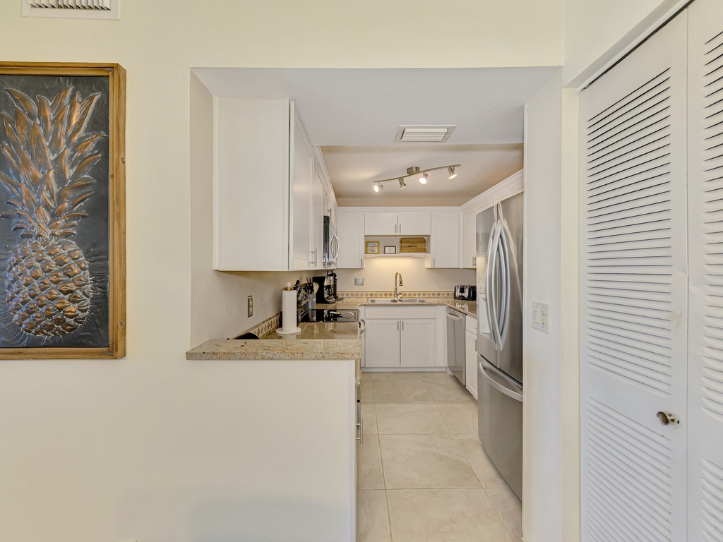 Your fully equipped kitchen features granite counters, stainless appliances, and everything needed to create memorable meals during your stay.