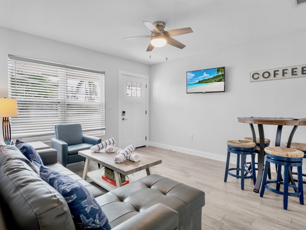 Living Room with Plush Seating and TV
