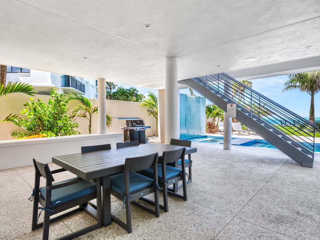 Dine Poolside with an Outdoor Grill and Gulf views