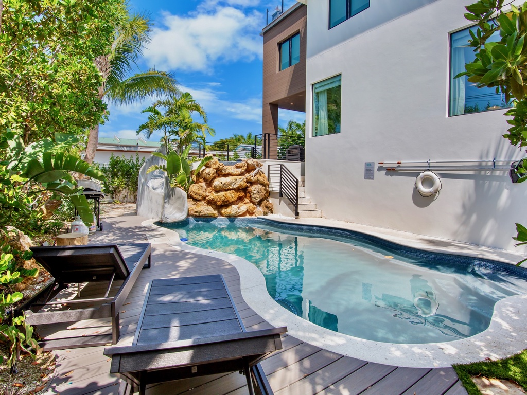Poolside Water Slide, Loungers and BBQ