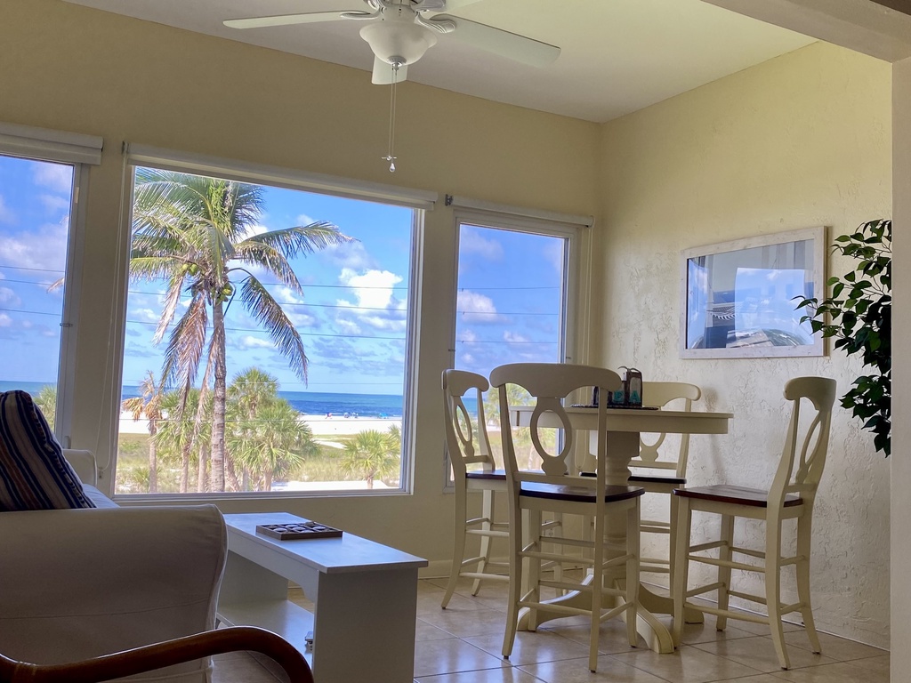 Screened lanai with comfortable seating