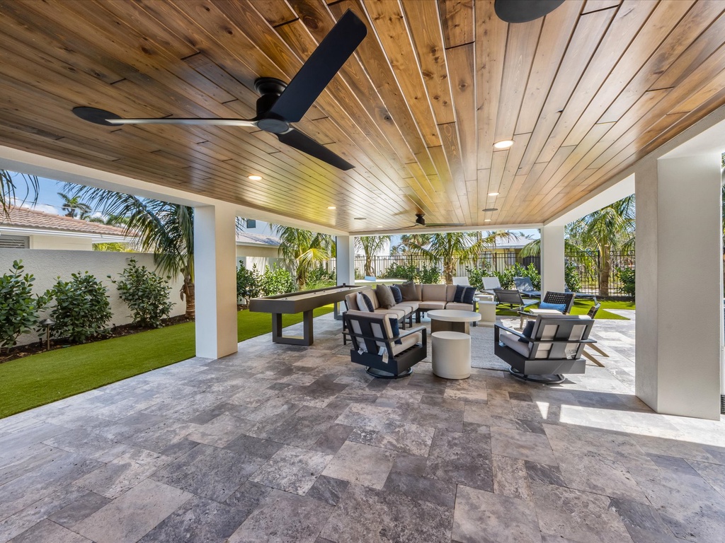 Outdoor Covered Seating and Shuffleboard Table