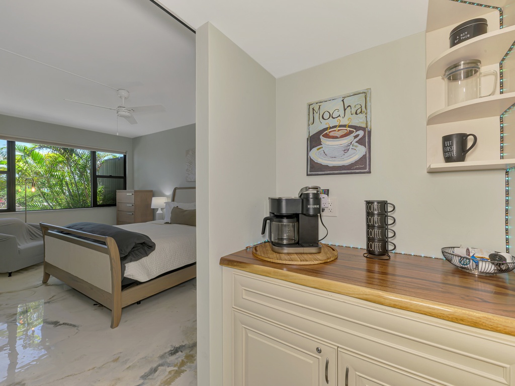 Wake up to your personal coffee station with everything ready for that perfect morning brew, steps from your comfortable bedroom.