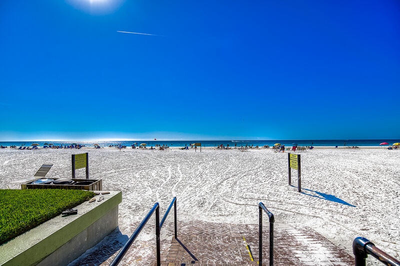 Beautiful sandy beach steps away