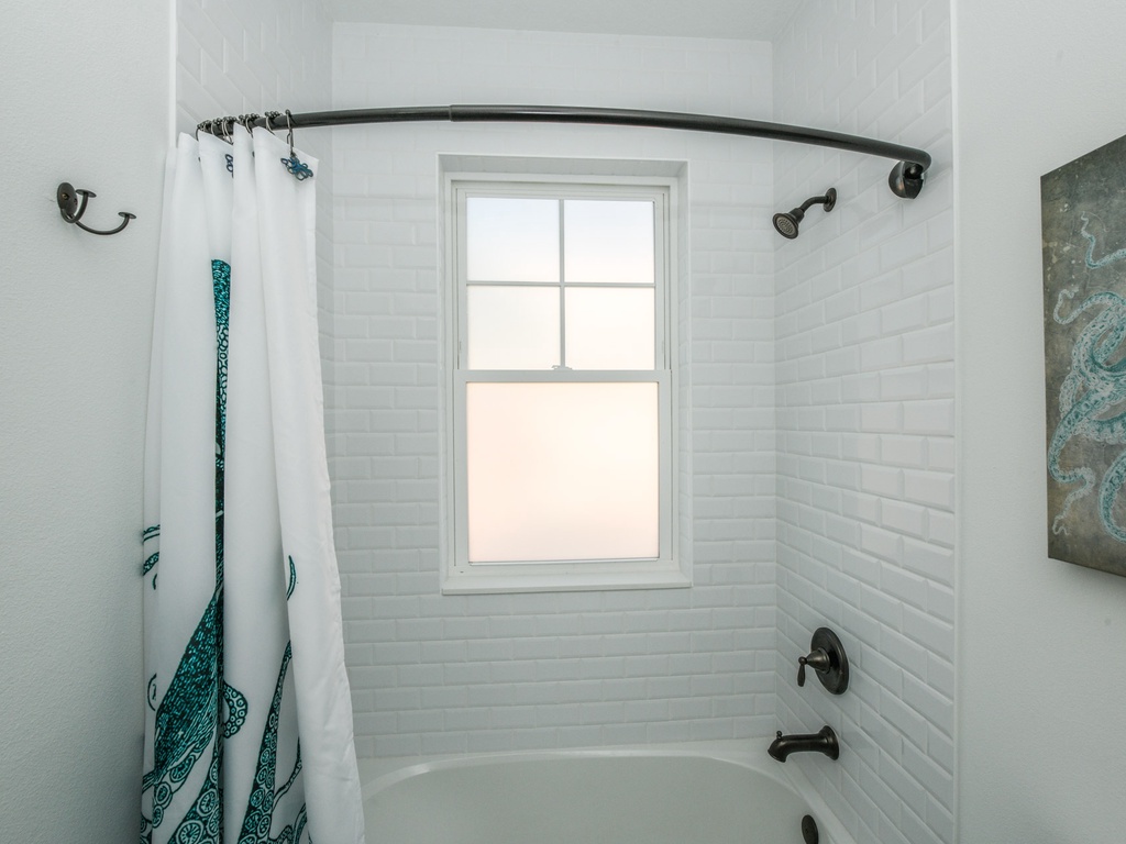 Fifth Bathroom with a tub/shower combo