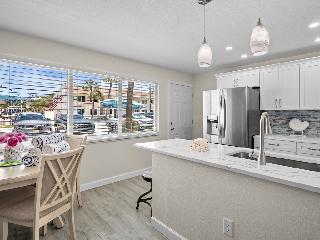 Stylish island with barstools