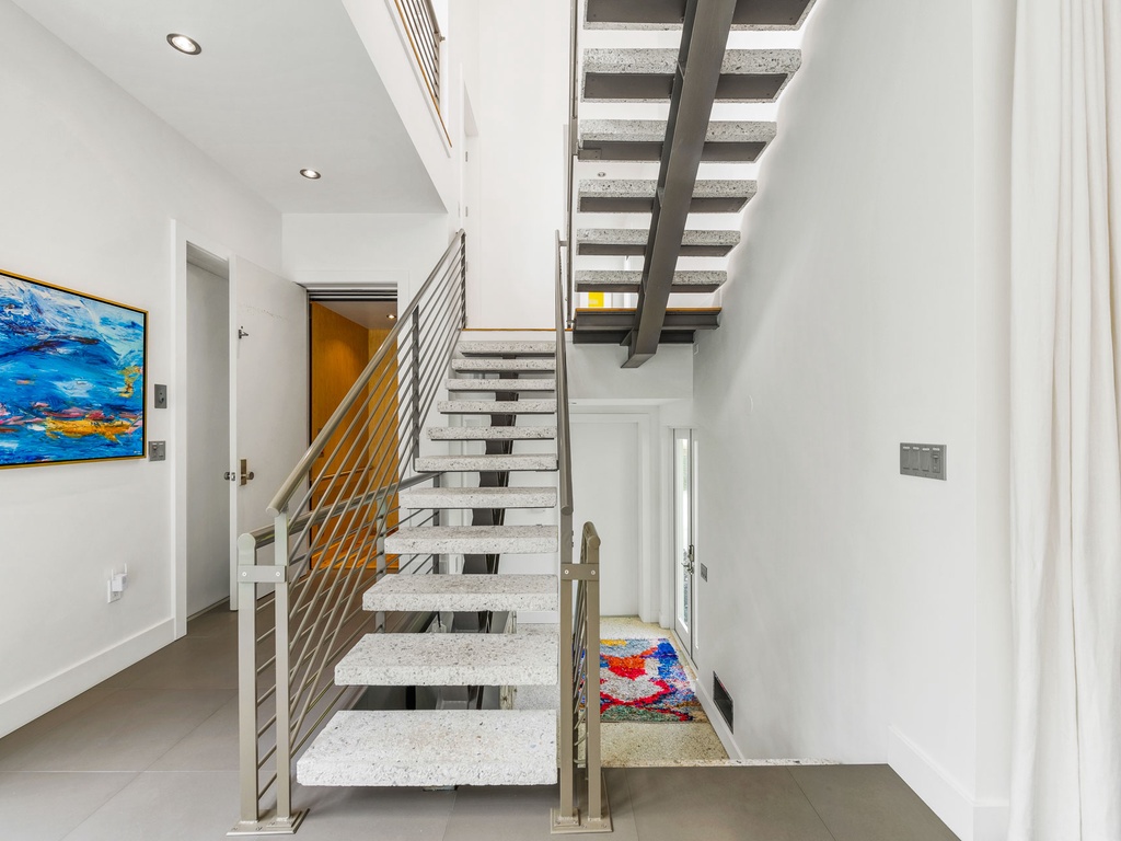 Entrance Foyer-Floating Staircase & Elevator to All Floors