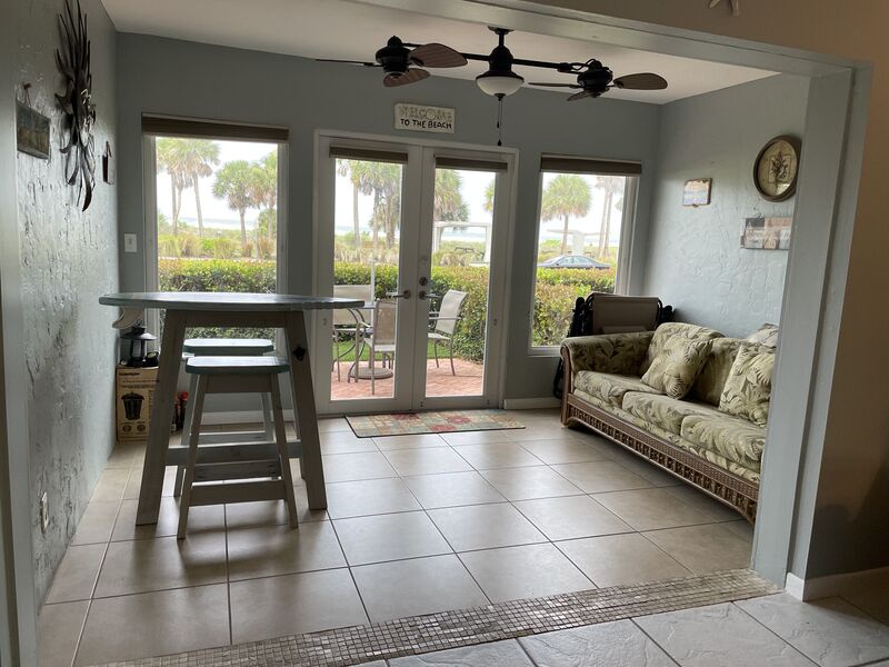 Living Room with doors opening to your private patio