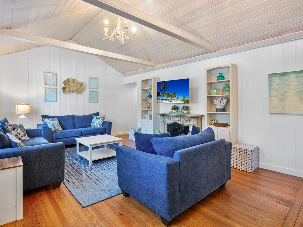 Living area with plush seating and TV