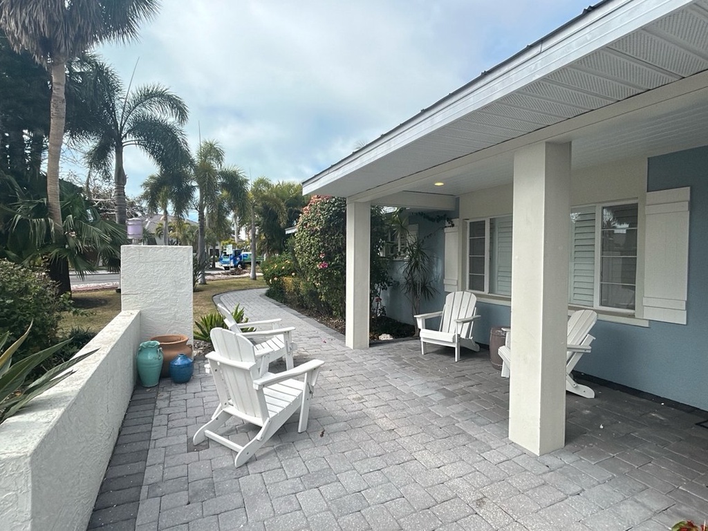 Your private covered patio with stylish seating invites morning coffee and evening relaxation.