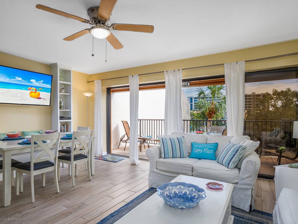Your bright, beachy living space flows seamlessly to your private balcony, where tropical breezes and peaceful views await.