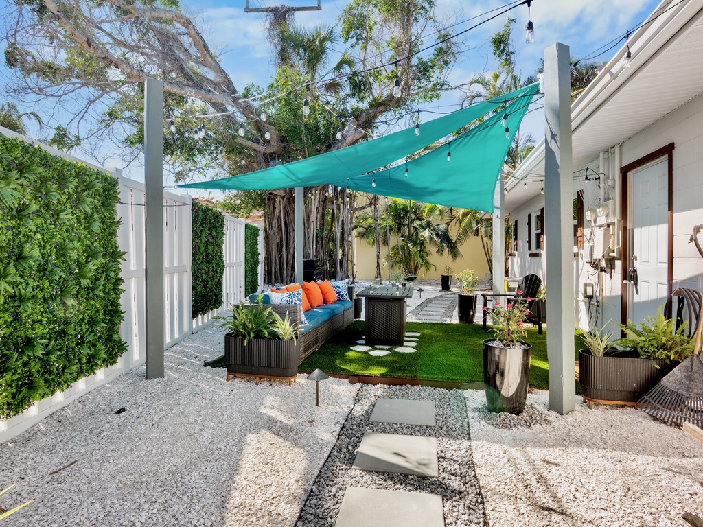 Shared backyard oasis with outdoor seating