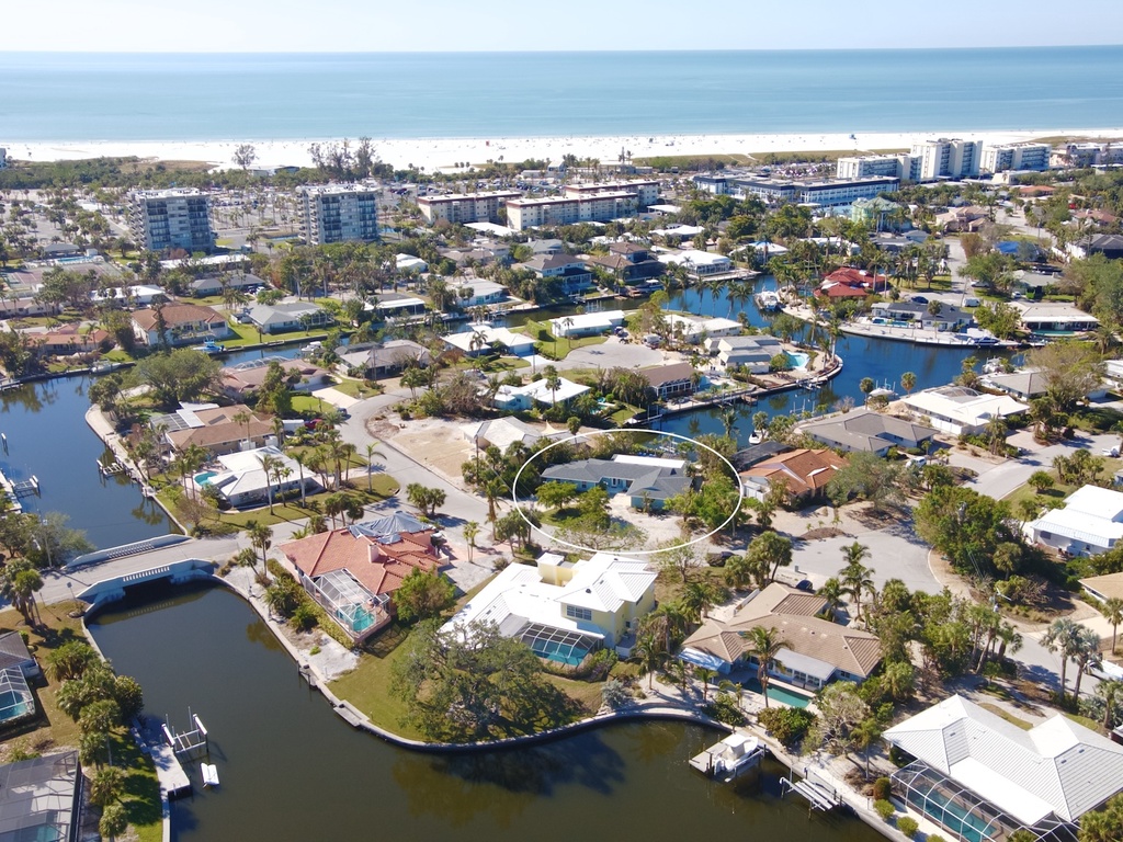 Aerial view of the home on the canal