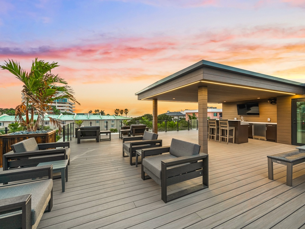 Rooftop bar area with TV for entertainment