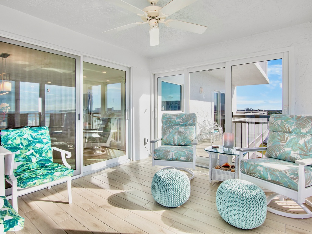 Relax in your tropical oasis with ocean-inspired seating and panoramic views stretching beyond.