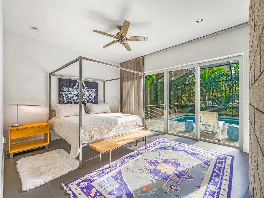 Master Bedroom - King Bed with Pool View and Sliding Door