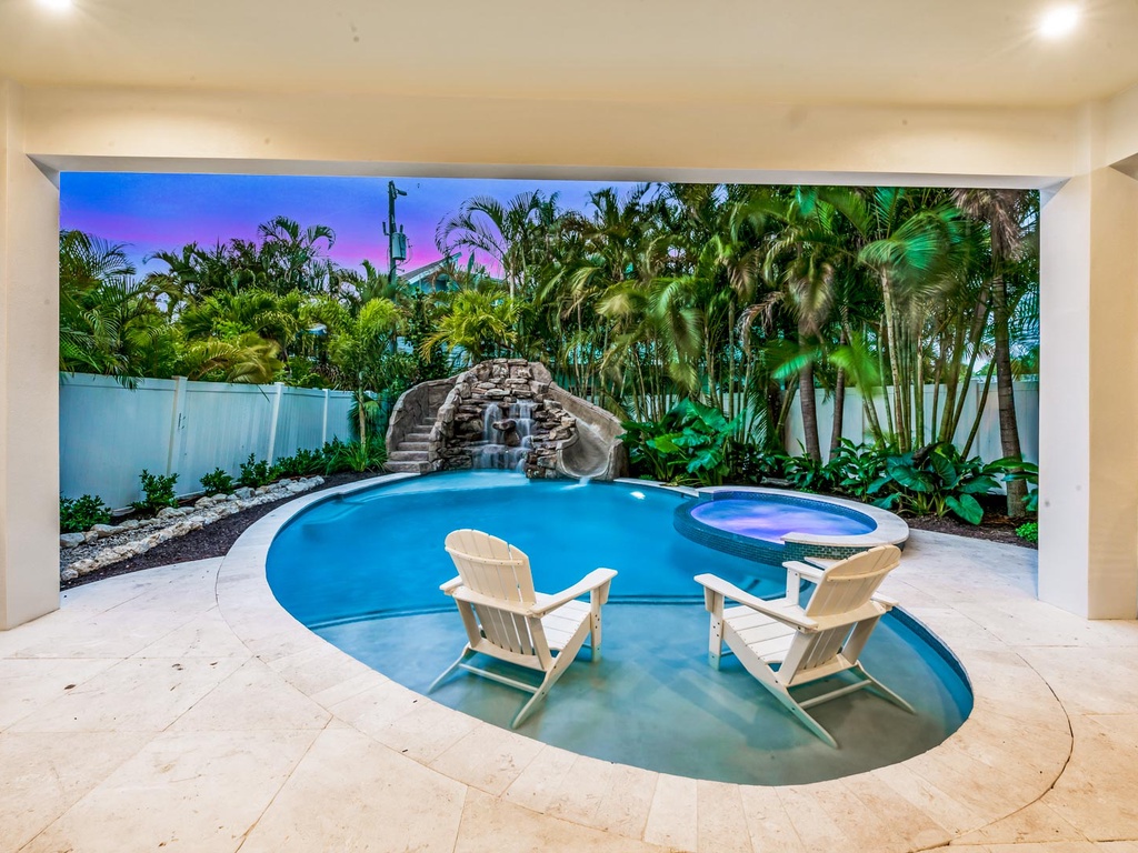Sit by the pool and enjoy the sunset