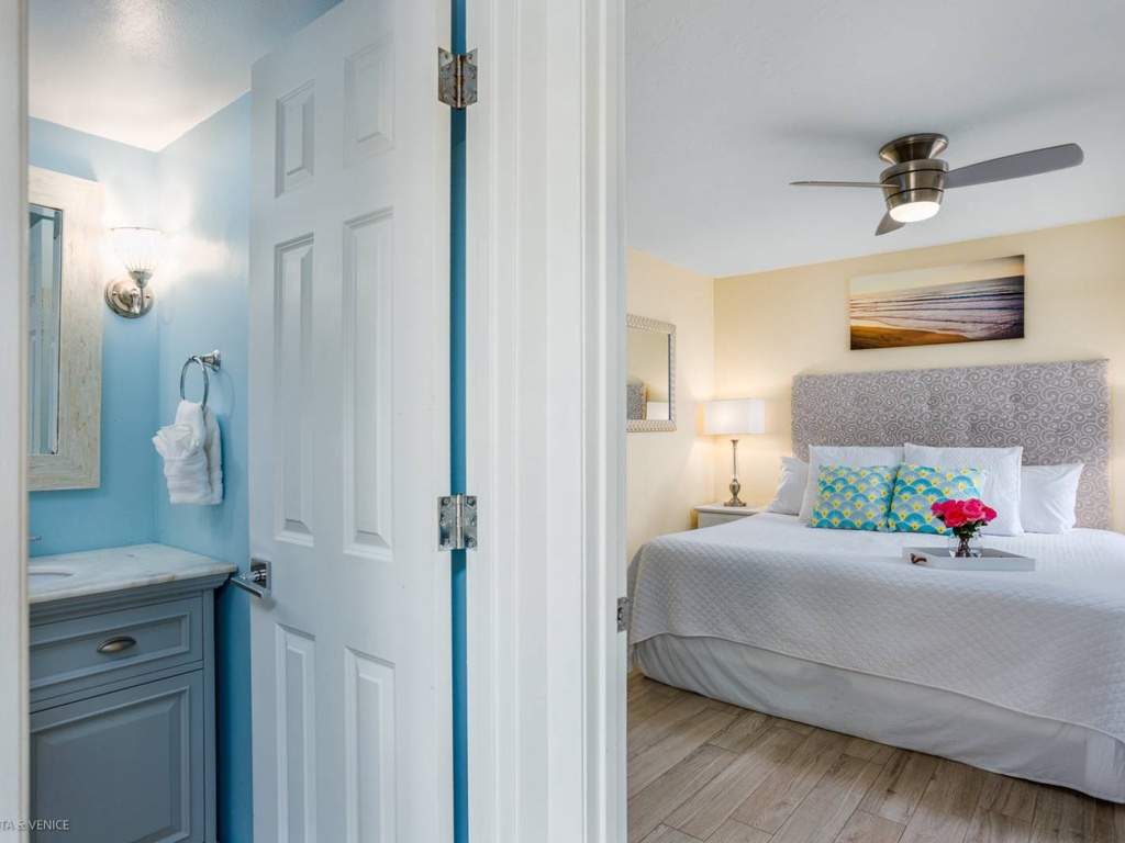 Unwind in your serene bedroom with crisp linens and coastal touches, plus your own private bathroom just steps away.