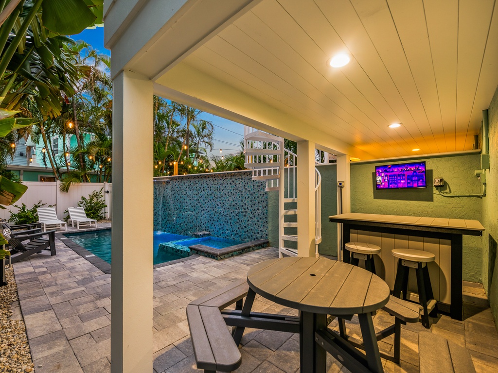 Outdoor Pool, Spa, and Seating - Village Time