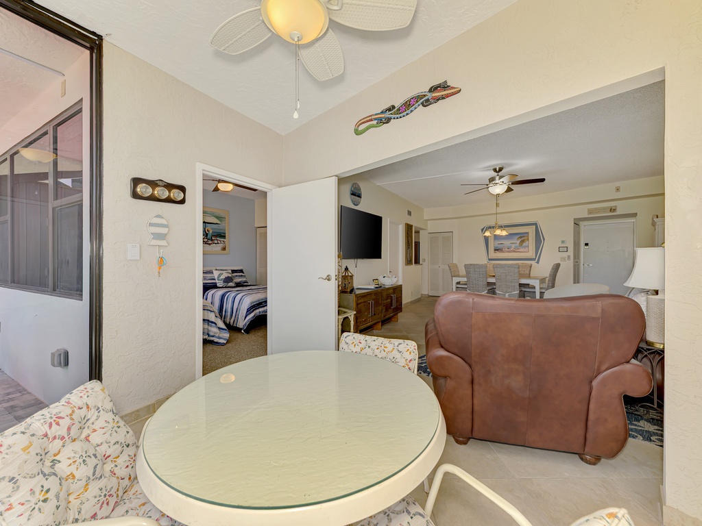 Your spacious retreat flows seamlessly from cozy seating to relaxing bedroom, with coastal touches throughout.