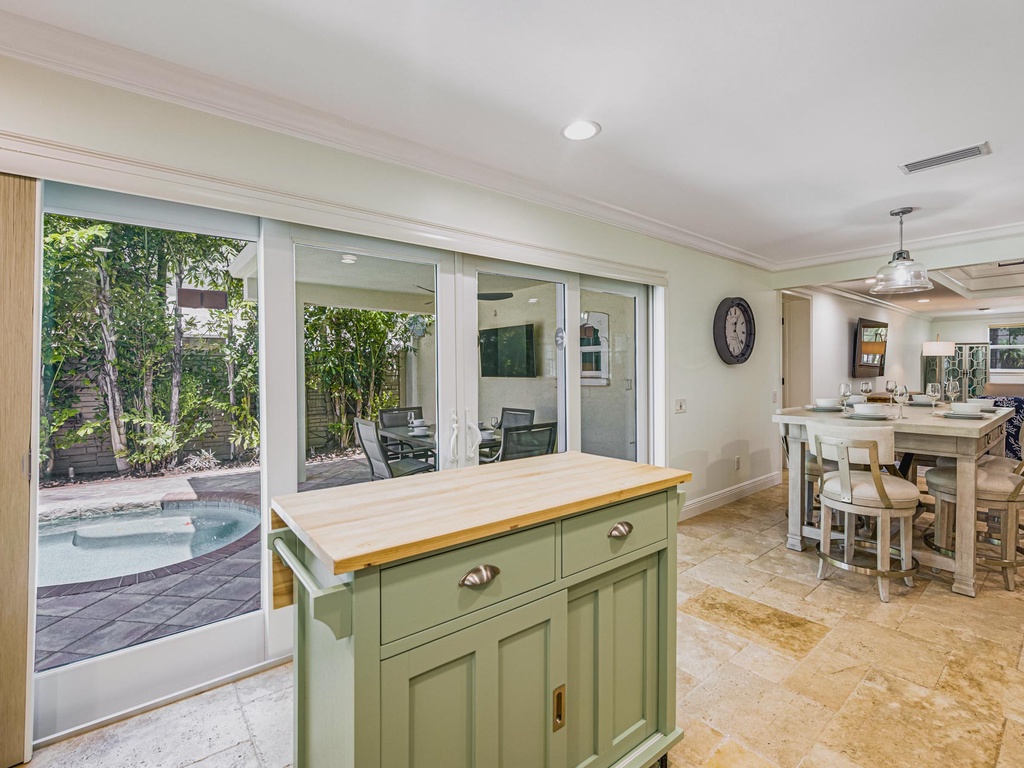 Kitchen with patio and pool access