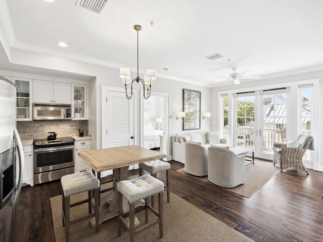 Enjoy this bright, open living space where your kitchen flows seamlessly into the cozy lounge area, perfect for morning coffee and evening relaxation.