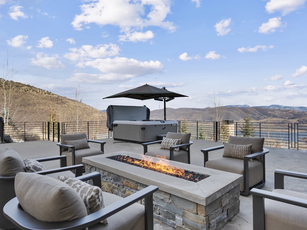 Gather around your private fire pit on this stunning rooftop terrace, where mountain vistas and crackling flames create perfect evenings.