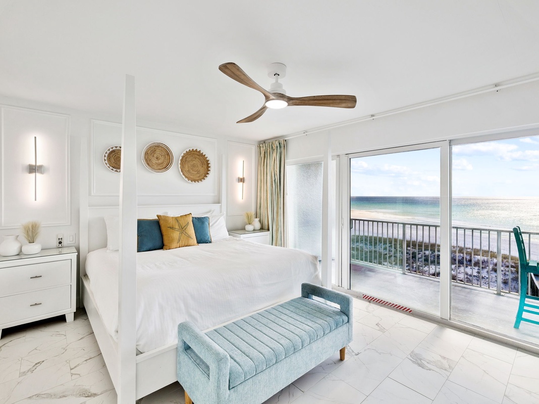 Wake up to breathtaking ocean views from your serene bedroom, where coastal breezes flow through your private balcony sanctuary.