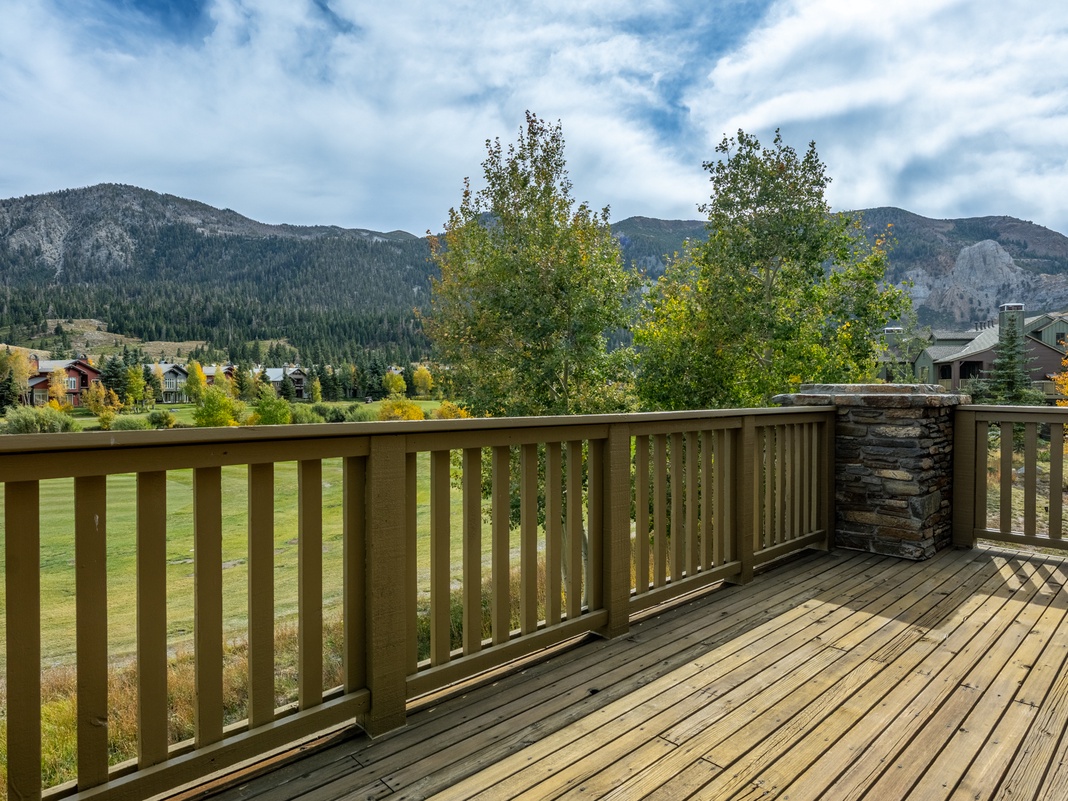 Sip your morning coffee on this private deck with sweeping mountain and valley views, where crisp alpine air and golden autumn foliage set the scene for pure mountain relaxation.