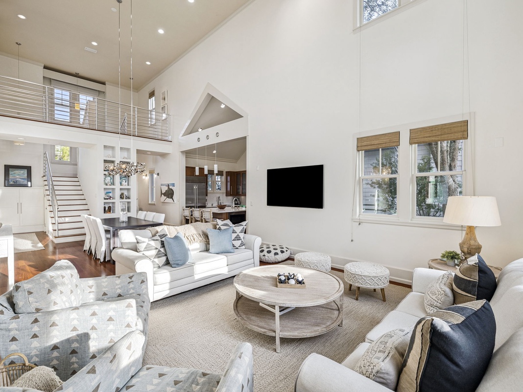 Relax in your bright, airy living space with soaring ceilings, plush seating, and stylish decor that creates the perfect home away from home.