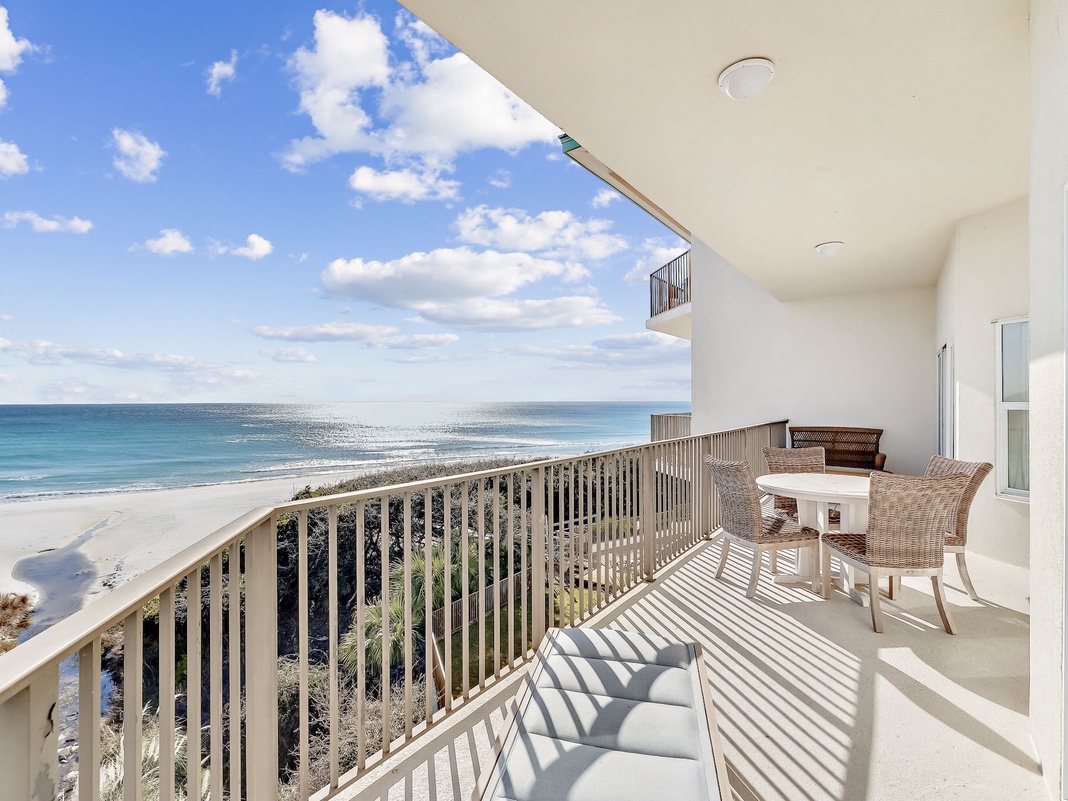 Your private balcony offers breathtaking ocean views where you can sip morning coffee while watching waves kiss pristine white sand.