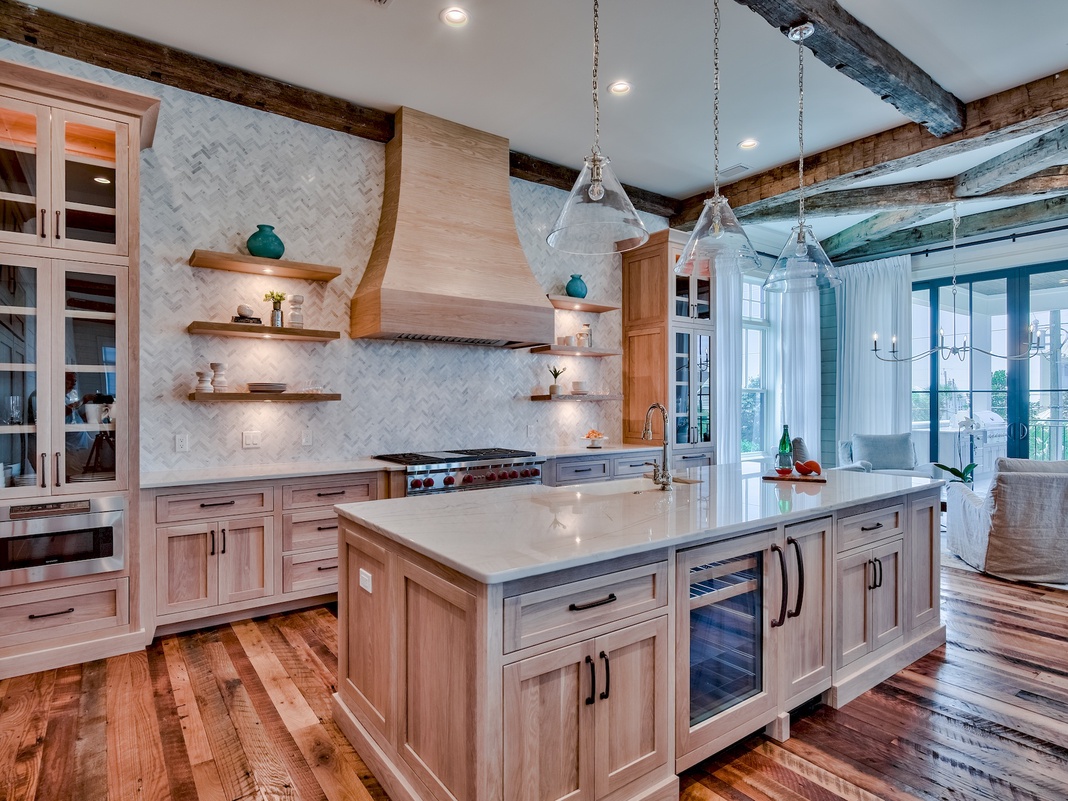 Your dream kitchen awaits with marble countertops, custom cabinetry, and rustic beams creating the perfect space for memorable meals.